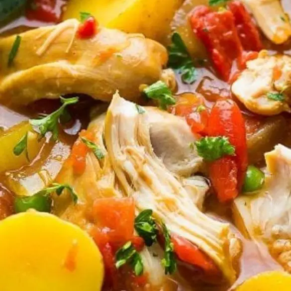 Crock pot Spanish chicken stew recipe. Boneless and skinless chicken thighs with vegetables cooked in a slow cooker. #slowcooker #crockpot #chicken #dinner #stew #vegetables #homemade