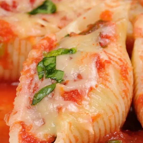 Air fryer cheese-stuffed shells recipe. Learn how to cook yummy stuffed shells with tomato sauce in an air fryer. #airfryer #dinner #pasta #italian