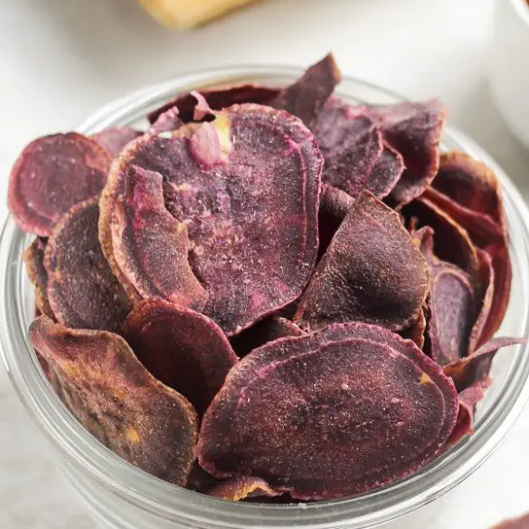 Air fryer purple potato chips recipe. Learn how to cook crispy purple potato chips in an air fryer. #airfryer #potato #chips #appetizer #snacks