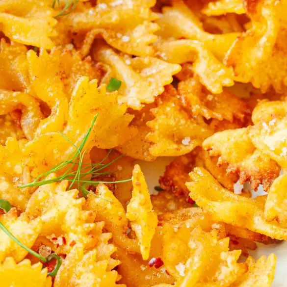 Air fryer pasta chips recipe. Learn how to cook cheesy pasta chips in an air fryer. Yummy appetizer! #airfryer #chips #pasta #appetizer #easy #crispy