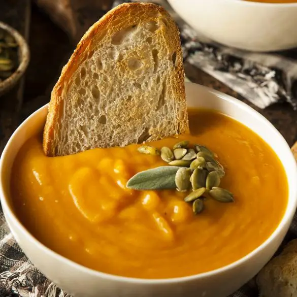 Air fryer butternut squash soup recipe. This butternut squash soup is a perfect vegan soup for the fall season. With just four ingredients, this recipe is sure to please everyone in your family. #airfryer #soup #dinner #healthy #easy #vegetarian