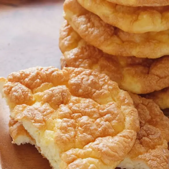 Air fryer cloud bread recipe. Turn your air fryer into a bread maker with this easy cloud bread recipe. The bread is crispy on the outside and fluffy on the inside. #airfryer #bread #desserts #breakfast #healthy #homemade #eggs #yogurt