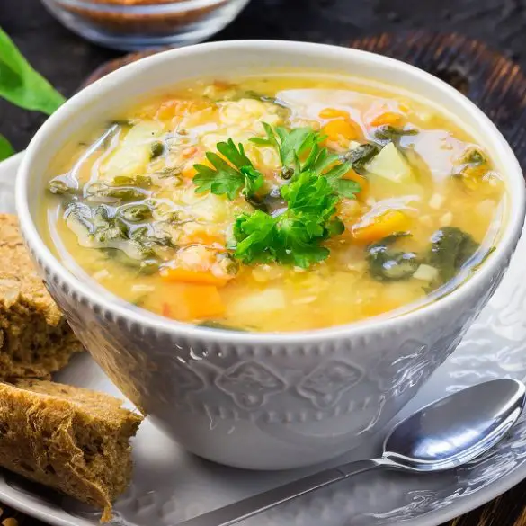 Slow cooker red lentil and vegetable soup. Stay warm and cozy this season with this healthy slow cooker lentil soup. #slowcooker #crockpot #soups #dinner #homemade #vegetarian #vegan