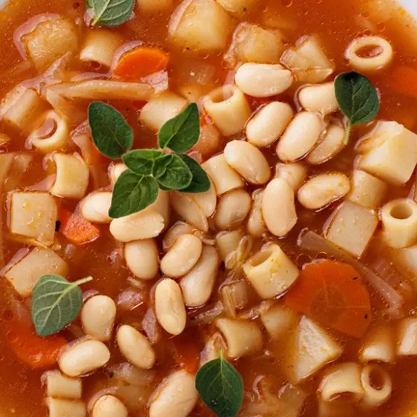 Slow cooker white bean and pasta soup. Looking for a hearty soup that's healthy, hearty, and easy to make? This White Bean and Pasta Soup is the perfect winter meal. #slowcooker #crockpot #soups #dinner #vegetarian #healthy #easy #yummy