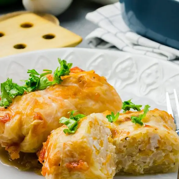 Slow cooker lentil-stuffed cabbage rolls. These are vegan, gluten-free lentil-stuffed cabbage rolls that are cooked in a crockpot. A perfect, hearty dish for the winter months! #slowcooker #crockpot #cabbage #dinner #vegetarian #vegan #healthy #recipes #homemade