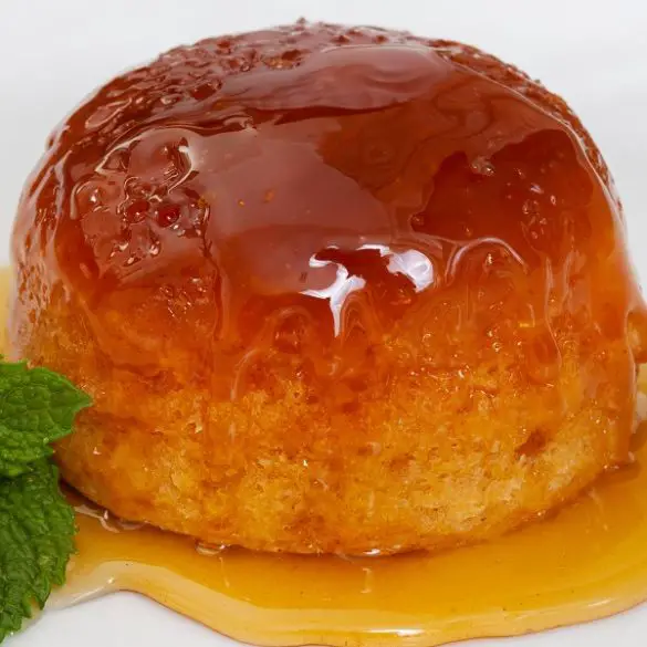 Slow cooker treacle sponge. A treacle sponge is a light, spongy sponge cake that is cooked slowly (i.e., in a slow cooker) over a long period of time. This recipe produces an airy and delicate sponge, with the perfect amount of sweetness. #slowcooker #crockpot #cakes #desserts #breakfast #homemade #recipes #cooking #sweet #yummy #delicious #easy