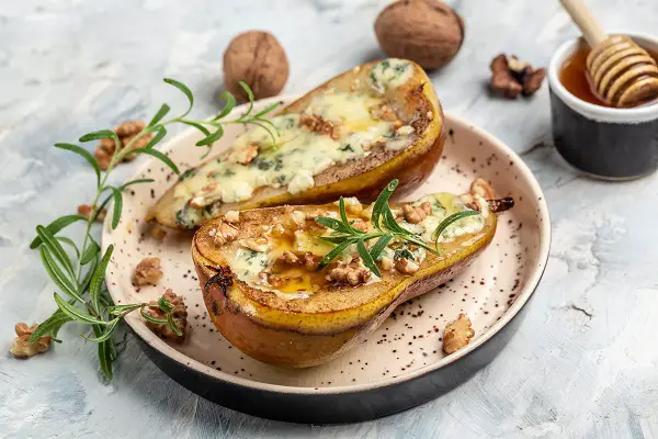 Air fryer roasted pears with blue cheese. Enjoy the fall flavors of air fryer roasted pears topped with creamy blue cheese.#AirFryerRecipes #HealthyDesserts #PearsForDinner #BlueCheeseLove #OvenFreeCooking